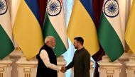 Ukrainian President Volodymyr Zelensky (R) and Indian Prime Minister Narendra Modi shake hands after their talks in Mariinskyi Palace in Kyiv, on August 23, 2024. (Photo by Sergei Supinsky / AFP)
