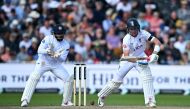 England's captain Ollie Pope plays a shot on day four of the first Test cricket match between England and Sri Lanka at Old Trafford cricket ground in Manchester, north-west England on August 24, 2024. (Photo by Paul ELLIS / AFP)