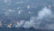 Smoke billows from an area targeted by an Israeli airstrike on the southerm Lebanese village of Khiam on August 25, 2024, amid escalations in the ongoing cross-border tensions as fighting continues in the Gaza Strip. (Photo by Rabih Daher / AFP)
