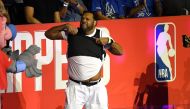 US Rapper Fatman Scoop performs during a time out in the second half in game four of the Western Conference Finals between the Phoenix Suns and the LA Clippers at Staples Center on June 26, 2021 in Los Angeles, California. (Photo by Kevork DJANSEZIAN / GETTY IMAGES NORTH AMERICA / AFP)
