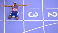 An overview shows US Jayden Blackwell reacting after winning the men's 100 T38 final event at the Stade de France, Saint Denis, north of Paris on August 31, 2024, during the Paris 2024 Paralympic Games. (Photo by Martin BUREAU / AFP)
