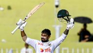 Bangladesh's Litton Das celebrates after scoring a century (100 runs) during the third day of the second and last Test cricket match between Pakistan and Bangladesh, at the Rawalpindi Cricket Stadium in Rawalpindi on September 1, 2024. (Photo by Aamir QURESHI / AFP)
