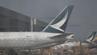 Cathay Pacific aircraft are seen in the maintenance hanger at the international airport in Hong Kong on September 3, 2024. Photo by Peter PARKS / AFP