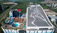 An aerial view shows the exterior view of the Shanghai L*SNOW Indoor Skiing Theme Resort, the world's largest indoor skiing resort during its official opening day in Shanghai on September 6, 2024. Photo by STRINGER / AFP