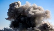 Smoke from Israeli bombardment rises in an area that was ordered to be evacuated by the Israeli army in the southeast of Khan Yunis in the southern Gaza Strip on September 8, 2024. (Photo by Bashar Taleb / AFP)