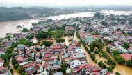 This aerial picture shows flooded streets and buildings after Super Typhoon Yagi hit northern Vietnam, in Yen Bai on September 9, 2024. Photo by Nguyen NGUYEN / AFP.