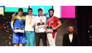 Qatar’s Faris Ali Al Thani (right) poses on the podium along with other medal winners. 