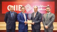 Mohammed Khair Barhoumeh, Chief Operation Officer at QIIB receiving the award from Georges Bou Nemar, Representative and Relationship Manager at Commerzbank Frankfurt.