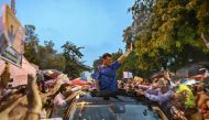 Arvind Kejriwal, Chief Minister of Delhi and leader of the Aam Aadmi Party (AAP), greets his supporters after Supreme Court granted him bail in New Delhi on September 13, 2024. (Photo by Money Sharma / AFP)