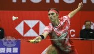 Denmark's Viktor Axelsen hits a return against China’s Lei Lanxi during the men's singles final at the Hong Kong Open badminton tournament on September 15, 2024. Photo by Holmes CHAN / AFP.