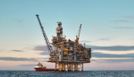 A view of an offshore oil rig during cargo operations.