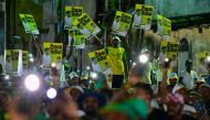 Supporters of Sri Lanka's Samagi Jana Balawegaya party leader and presidential candidate Sajith Premadasa, attend an election rally being addressed by him ahead of the upcoming presidential elections in Colombo on September 11, 2024. Photo by Ishara S. KODIKARA / AFP.