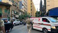 Lebanese army soldiers stand guard as an ambulance rushes wounded people to a hospital in Beirut on September 17, 2024, after explosions hit locations in several Hezbollah strongholds around Lebanon amid ongoing cross-border tensions between Israeli entity and Hezbollah fighters. Photo by Anwar AMRO / AFP.