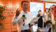 Hsu Ching-kuang (L), head of Taiwanese company Gold Apollo, speaks to the media outside the company's office in New Taipei City on September 18, 2024. Photo by Yan ZHAO / AFP.