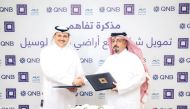 Eng. Fahad Abdullatif Al Jahrami, Chief Development and Asset Management Officer - Qatar at Qatari Diar and Adel Ali Al Malki, Senior Executive Vice President – Group Retail Banking at QNB Group during the agreement signing.