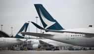 This photo taken on December 13, 2023 shows Cathay Pacific aircraft parked at Hong Kong international airport. Photo by Peter PARKS / AFP