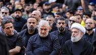  Naim Qassem (R), deputy secretary-general of Hezbollah, and Mohammed Raad (C), head of Hezbollah's bloc in the Lebanese parliament, attend the funeral of top Hezbollah military commander Ibrahim Aqil in Beirut's southern suburbs on September 22, 2024.(Photo by AFP)