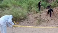 Security personnel examine the site of a bomb explosion, at Malam Jabba in the Swat district of Khyber Pakhtunkhwa province on September 22, 2024. A Pakistan policeman was killed and three others injured after a roadside bomb hit a convoy of foreign diplomats in the northwest, police said on September 22. (Photo by Mehboob UL HAQ / AFP)