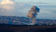 Smoke billows from the site of an Israeli airstrike in Adshit, near the Lebanon-Israel border, on September 23, 2024. Photo by Ammar Ammar / AFP.