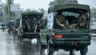 File: Army personnel patrol on a road in Rawalpindi / AFP 