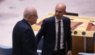 Lebanon's Prime Minister Najib Mikati (L) speaks to French Minister of Foreign Affairs Jean-Noel Barrot during a a UN Security Council meeting at the United Nations headquarters in New York City on September 25, 2024. (Photo by Leonardo Munoz / AFP)
 