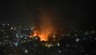 Smoke billows from the site of an Israeli airstrike that targeted a neighborhood in Beirut's southern suburb early on September 28, 2024. (Photo by Fadel Itani / AFP)