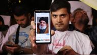 Photo used for demonstration purposes. A man shows a photo of Hassan Nasrallah, Secretary-general of Hezbollah, as people demonstrate against Israel and the attack on Lebanon at Palestine square in Tehran on September 28, 2024. Photo by ATTA KENARE / AFP.