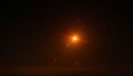 Photo used for demonstration purposes. Rockets fired from southern Lebanon are intercepted by Iron Dome air defence system over the Upper Galilee region on September 27, 2024. Photo by Jalaa MAREY / AFP.