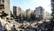 Photo used for demonstration purposes. People check the rubble of buildings which were levelled on September 27 by Israeli strikes that targeted and killed Hezbollah leader Hassan Nasrallah in the Haret Hreik neighbourhood of Beirut's southern suburbs, on September 29, 2024. Photo by AFP.