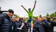 Slovenia's Tadej Pogacar celebrates with his team after winning the men's Elite Road Race cycling event during the UCI 2024 Road World Championships, in Zurich, on September 29, 2024. Photo by Fabrice COFFRINI / AFP.
