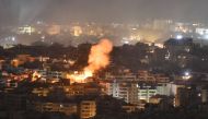 Smoke rises from the site of an Israeli airstrike that targeted a neighborhood in Beirut's southern suburb early on October 1, 2024. (Photo by Fadel Itani / AFP)