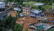 A general view of a landslide-affected village is pictured following heavy rains in Lalitpur district on the outskirts of Kathmandu on October 1, 2024. (Photo by Prakash Mathema / AFP)