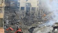 A picture shows a view of the destruction at the site of an overnight Israeli airstrike on the Laylaki neighbourhood in Beirut's southern suburbs on October 1, 2024. (Photo by AFP)