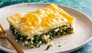 Greek mixed greens pie with phyllo crust. (Photo by Scott Suchman for The Washington Post; food styling by Lisa Cherkasky for The Washington Post)