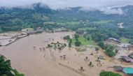 This aerial handout photo taken and released on October 3, 2024 by the Elephant Nature Park shows flood waters submerging the sanctuary in Thailand's northern Chiang Mai province. (Photo by Handout / Elephant Nature Park / AFP) 