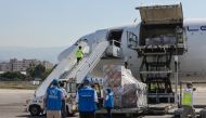 Photo used for demonstration purposes. Ground staff unload a medical aid shipment provided by the World Health Organization (WHO) and the United Nations High Commissioner for Refugees (UNHCR), from a plane at the Beirut International Airport on October 4, 2024. Photo by IBRAHIM AMRO / AFP.