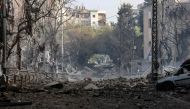 Rubble is scattered along a street in the aftermath of Israeli airstrikes on the Mreijeh neighbourhood in Beirut's southern suburbs on October 6, 2024. (Photo by ANWAR AMRO / AFP)
