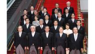 This picture taken on October 1, 2024 shows Japan's new Prime Minister Shigeru Ishiba (front C) posing during a photo session with the members of his cabinet at the prime minister's official residence in Tokyo. (Photo by JIJI PRESS / AFP) 