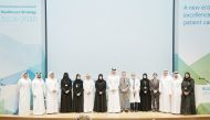 Minister of Public Health H E Dr. Hanan Mohamed Al Kuwari (seventh left) with other officials during the launch ceremony.