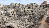 This overview shows destroyed buildings in Khan Yunis in the southern Gaza Strip on October 7, 2024. (Photo by Bashar Taleb / AFP)