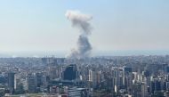 Smoke rises from the site of an Israeli airstrike that targeted a neighbourhood in Beirut's southern suburbs on October 8, 2024. (Photo by Mohammad Abou Al Ainain / AFP)