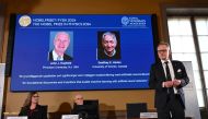 A screen shows the laureates of the 2024 Nobel Prize in Physics, US physicist John J Hopfield and Canadian-British computer scientist and cognitive psychologist Geoffrey E Hinton as member of the Nobel Committee for Physics Anders Irbaeck (R) delivers a speech following the announcement at the Royal Swedish Academy of Sciences in Stockholm, Sweden on October 8, 2024.
Photo by Jonathan NACKSTRAND / AFP.