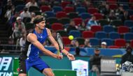 Germany's Alexander Zverev hits a return to Netherlands' Tallon Griekspoor during their men's singles match at the Shanghai Masters tennis tournament in Shanghai on October 8, 2024. (Photo by HECTOR RETAMAL / AFP)