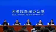 China's Finance Minister Lan Fon (C) speaks next to Vice Minister of Finance Wang Dongwei (2nd-L), Vice Minister of Finance Liao Min (2nd-R) and Vice Minister of Finance Guo Tingting (R) during a press conference in Beijing on October 12, 2024. (Photo by ADEK BERRY / AFP)
 