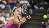 Belarus's Aryna Sabalenka hits a return against USA's Coco Gauff at the Wuhan Open tennis tournament on October 12, 2024. (Photo by WANG Zhao / AFP)