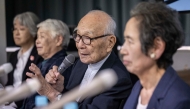 Member of the Nihon Hidankyo and atomic bomb survivor, co-chair Terumi Tanaka (2nd R) speaks during a press conference in Tokyo on October 12, 2024. Photo by Yuichi YAMAZAKI / AFP.
