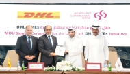 Commercial bank and DHL officials during the signing ceremony.