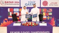 Qatar Tennis, Squash, Badminton and Padel Federation Secretary General Tareq Zainal (left) and Visit Qatar CEO Abdulaziz Al Mawlawi during the sponsorship signing ceremony yesterday.