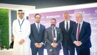 Officials pose for a group photo after the announcement on the second day of Cityscape exhibition.