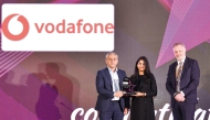 A Vodafone official receiving the award during the event.